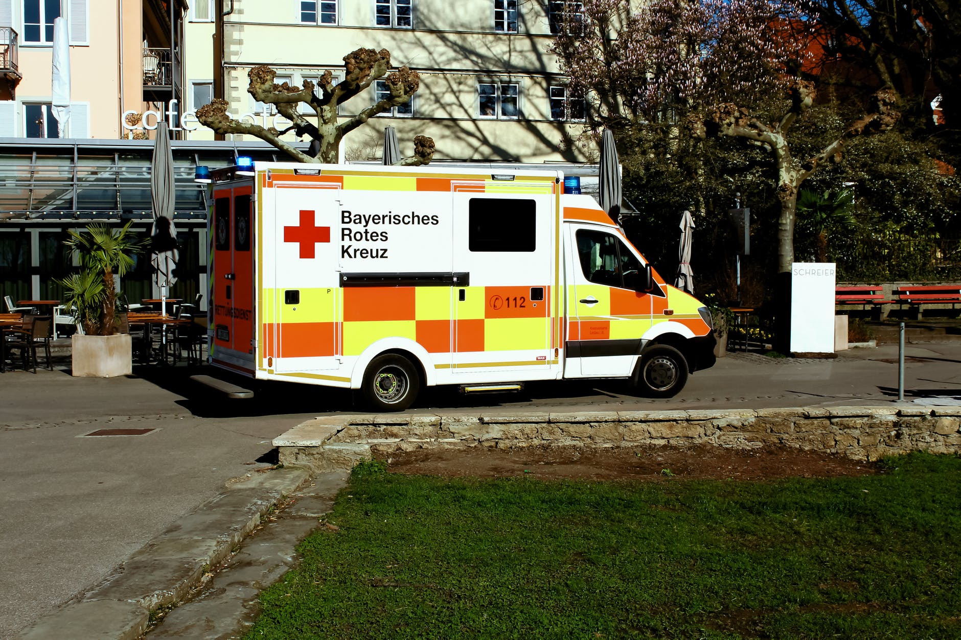ambulance truck parked near building